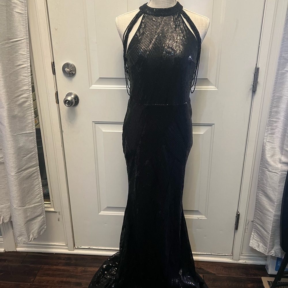 Black Sequin halter dress with beaded shoulder accents.